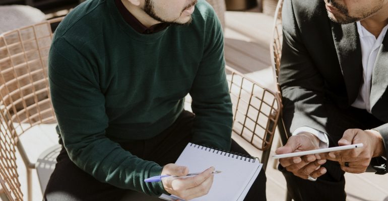 Business partners using  a tablet for discussion