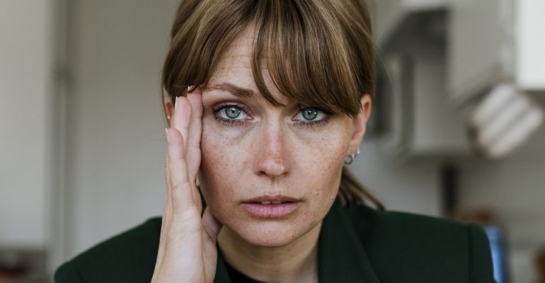 Stressed out woman working at home during coronavirus pandemic
